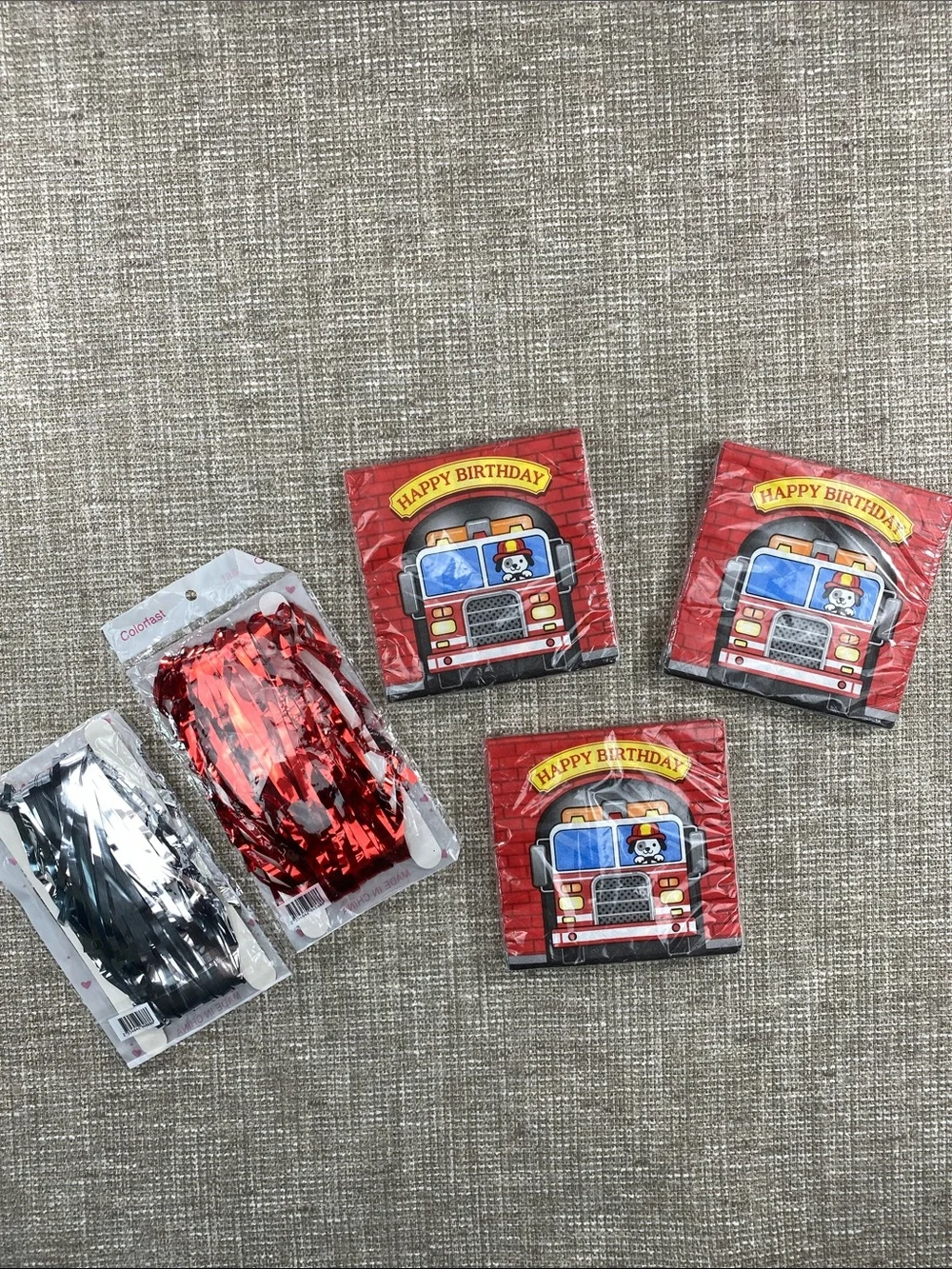 Happy Birthday Fire Truck Paper Napkins - red and silver foil fringe curtains